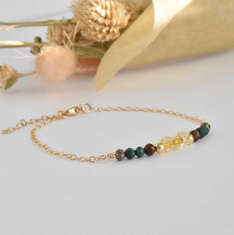 Dainty 14k Manifesting Bracelet to bring in wealth and money. Featuring malachite, pyrite, tiger's eye, and citrine. Handcrafted in the U.S.