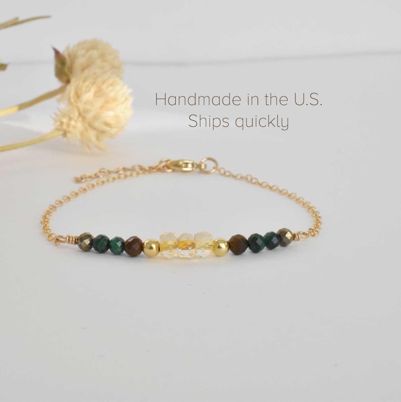 14k gold-filled bracelet gift to help manifest money, wealth, abundance, and new opportunities. Features malachite, citrine, pyrite, and tiger's eye—the perfect roommate gift.