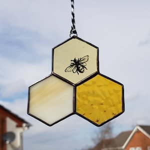 Stained glass honeycomb suncatcher with hand-painted bee. Gift idea. Birthday.