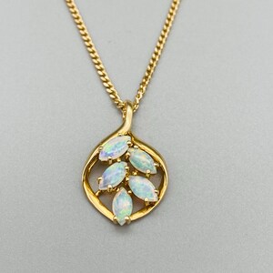 9 Carat Gold Opal Pendant On 16 Inch Gold Curb Chain