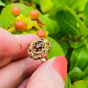 Vintage Garnet Ring: 9ct Gold Floral Halo, London 1976, Size O-UK