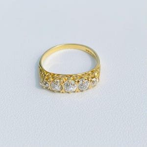 Vintage Five Stone Diamond Ring In 18 Carat Yellow gold With Hand Carved Gallery .Diamonds excellent colour .Size M Circa Approximtely 1940s