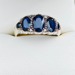 Vintage Sapphire And Diamond Ring In 9 Carat Yellow and White Gold ,Size N=UK.Sapphires are lovely midnight blue