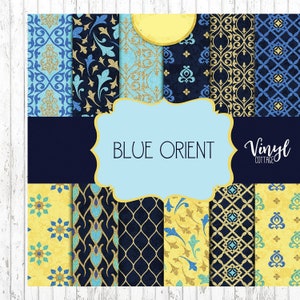 May include: A set of 12 digital papers featuring blue and gold geometric patterns with a glittery texture. The papers are titled "Blue Orient" and are from Vinyl Cottage.
