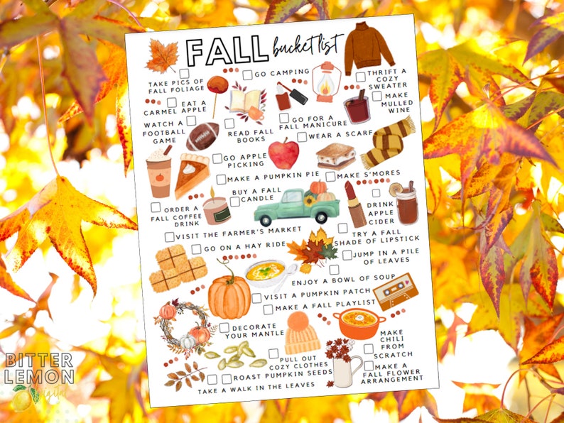 May include: A printed "Fall Bucket List" featuring illustrations of autumn activities such as apple picking, pumpkin pie, and drinking apple cider. The background is filled with golden autumn leaves.