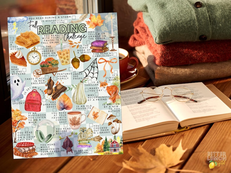 May include: A rectangular Fall Reading Challenge checklist featuring a light blue and white checkered background with various autumn-themed illustrations including pumpkins, leaves, books, a fox, a ghost, and coffee cups, with text prompts for reading tasks.