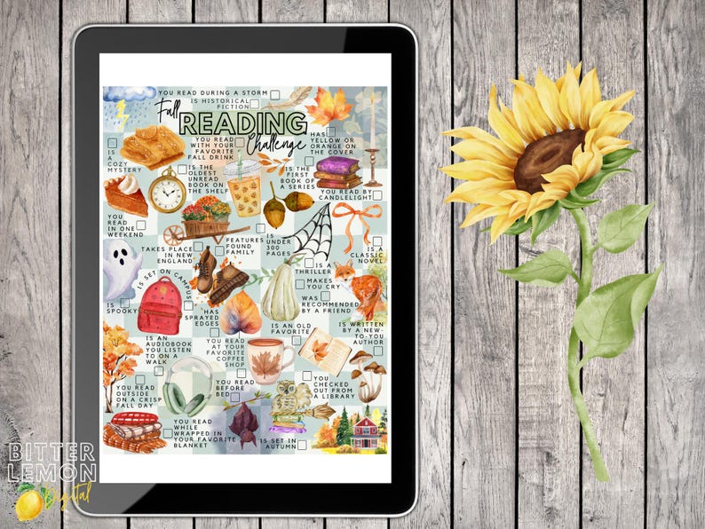May include: A digital tablet displaying a Fall Reading Challenge checklist with various autumn-themed illustrations including a pumpkin, ghost, fox, and books, accompanied by a large yellow sunflower graphic on the right side of the screen.