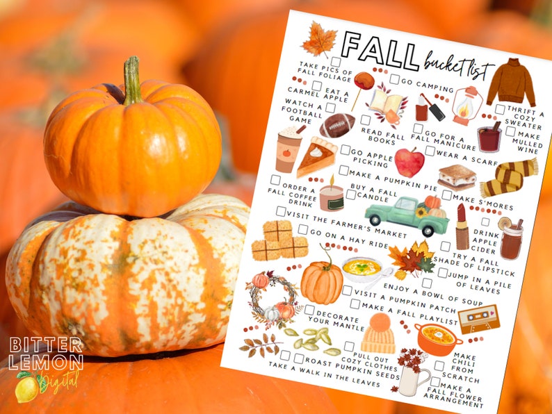 May include: Two pumpkins, one on top of the other, are in front of a blurred background of more pumpkins. A printed "Fall Bucket List" is visible, featuring autumn-themed activities like apple picking and making pumpkin pie.