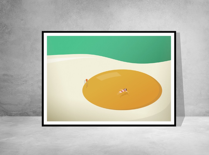 May include: A framed art print featuring a minimalist illustration of a person floating in a large, orange pool. The pool is set against a light beige background, with a green horizon line. The artwork is framed in black.