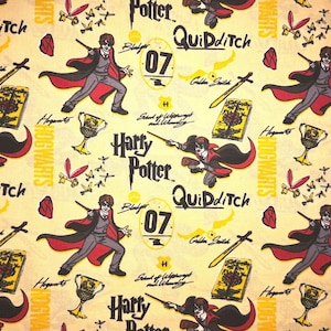 May include: A repeating pattern featuring Harry Potter imagery. The design includes illustrations of Harry Potter, the number 07, the words "Quidditch" and "Harry Potter", golden snitches, swords, and trophies, all on a light yellow background.