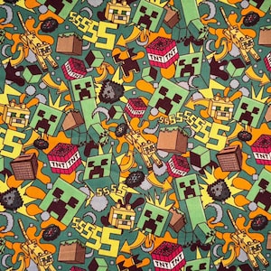 May include: A green, yellow, and brown patterned fabric featuring Minecraft characters, TNT blocks, and the number 5. The design includes pixelated figures and explosions, creating a dynamic and playful aesthetic.