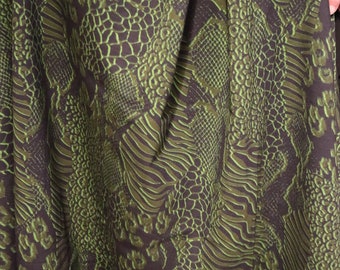 Green and black snake skin print ponte