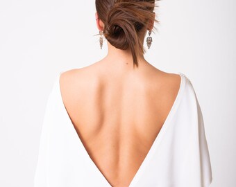 Backless couture wedding dress