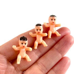 12 Small Sitting Plastic Babies Holding A Bottle 1.25" Baby Shower Favors