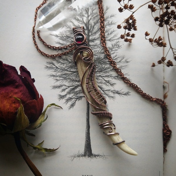 Custom copper wirewrapped crystal deer antler pendant.