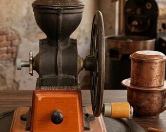 The Universal No. 109 classic cast iron coffee grinder, single-blade type.