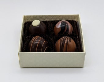 A box of handmade chocolate truffles, chocolate gift box, chocolate favors, assorted milk and dark chocolates, 4 pc