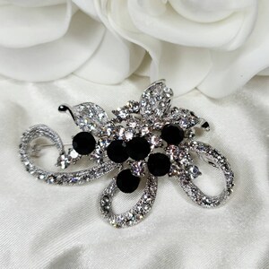 Vintage Roman Silver Tone Rhinestone Brooch