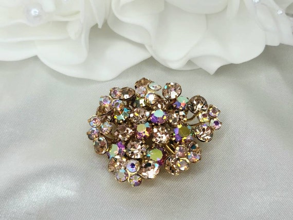 Triad brooch on sale