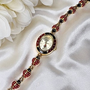 Joan Rivers Red and Gold Enamel Bangle Watch Joan Rivers Gold Band Wristwatches for sale | eBay main image 2
