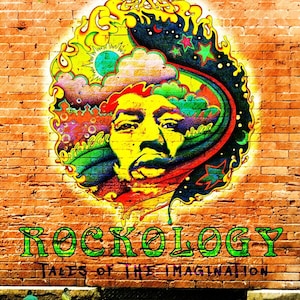 May include: A vibrant mural on a brick wall featuring the name "JEFFREY ROPP" in green letters above a colorful portrait. Below, the word "ROCKOLOGY" is displayed, with the tagline "TALES OF THE IMAGINATION". Two figures stand in front of the mural.