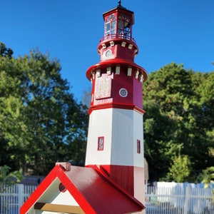 Custom Lighthouse well covers. Custom cover featured. Contact for design and pricing.