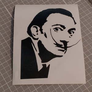 May include: Black and white silhouette of Salvador Dali, a famous artist, with his signature mustache.