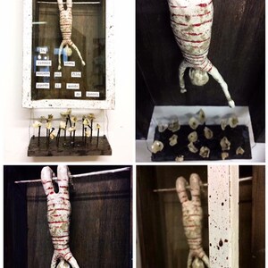 The acrobat: sculpture made with wood and modeling clay.