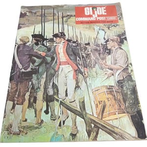 May include: Vintage G.I. Joe Command Post Yearbook. The cover features an illustration of soldiers in colonial era uniforms, with a drummer and a red and white banner. The text "G.I. Joe Command Post Yearbook Action Reading for Boys" is in a red rectangle.