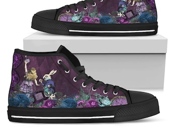 May include: High-top sneakers featuring a purple background with a graphic print of a rabbit in a blue coat and a person in a purple dress. The design includes blue and purple roses, a top hat, and a clock. The shoes have black laces and soles.