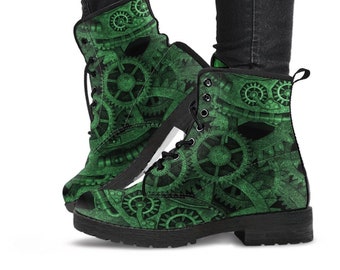 May include: Ankle-high lace-up boots featuring a vibrant green and black mechanical gear pattern. The boots have black laces, black metal eyelets, a black sole, and a black heel. The exterior surface is covered in a detailed print of interlocking gears.