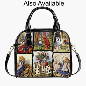 May include: A black handbag featuring a collage of six vintage-style illustrations from Alice in Wonderland, including characters like Alice, the Queen of Hearts, and playing card figures. The bag has black handles and gold-tone hardware.