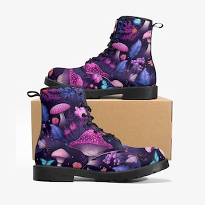 May include: Black leather boots with a purple and pink mushroom and butterfly print. The boots have a lace-up closure and a chunky sole.