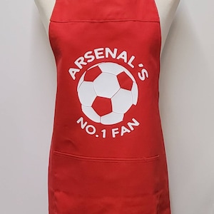 Fan Arsenalu nr 1 - możliwość personalizacji. Średniej wielkości fartuch dla dorosłych z kieszenią. Wyprodukowano w Anglii