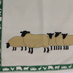 100 % cotton printed tea towel - farmyard animals. pigs, sheep and roosters. Made in England