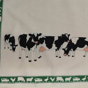 100 % cotton printed tea towel - farmyard animals. Cows, sheep and roosters. Made in England