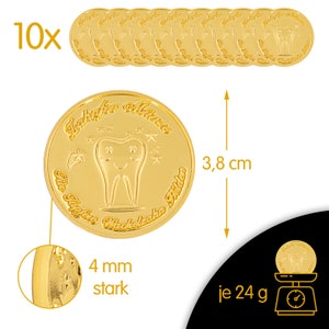 K&ouml;nnte beinhalten: Zehn goldfarbene zahnf&ouml;rmige Token mit dem Text "Zahnaffe Milne" und "F&uuml;r tapfere Milchz&auml;hne Helden" am Rand. Jeder Token ist 3,8 cm im Durchmesser und 4 mm dick. Die Token wiegen jeweils 24 Gramm.