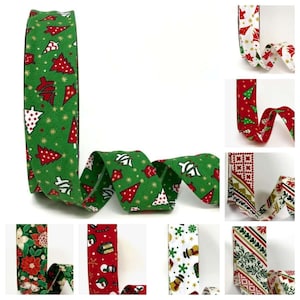 Christmas themed 18mm/30 mm bias binding. Green, white, red. Bunting making. Per Metre