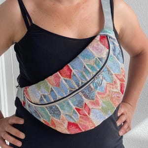 XL fanny pack in turquoise, coral, and sea green sequined jacquard