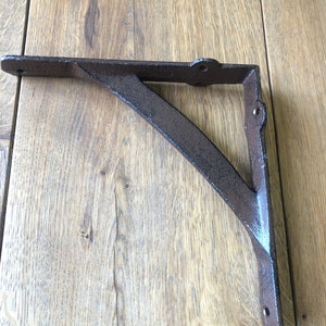 7 1/2" Cast iron shelf bracket open kitchen shelving corbel shelf brown with black highlights.