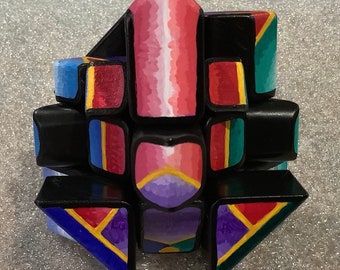 Karājiometori — hand painted Rubik’s cube with two soloutions.