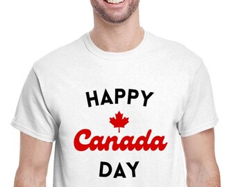 May include: White t-shirt with the text "HAPPY CANADA DAY" in black and red lettering. A red maple leaf is between the words "HAPPY" and "CANADA".
