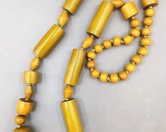 Vintage jaren 1930 art-deco bakelieten ketting met butterscotch gesneden kralen • 86 cm lang