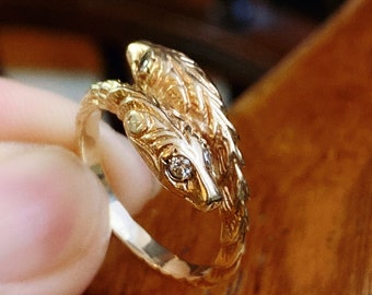 A Classic Detailed Double Headed 14K Gold Snake Ring With Diamonds
