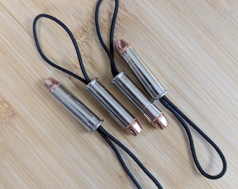 Bullet zipper pulls