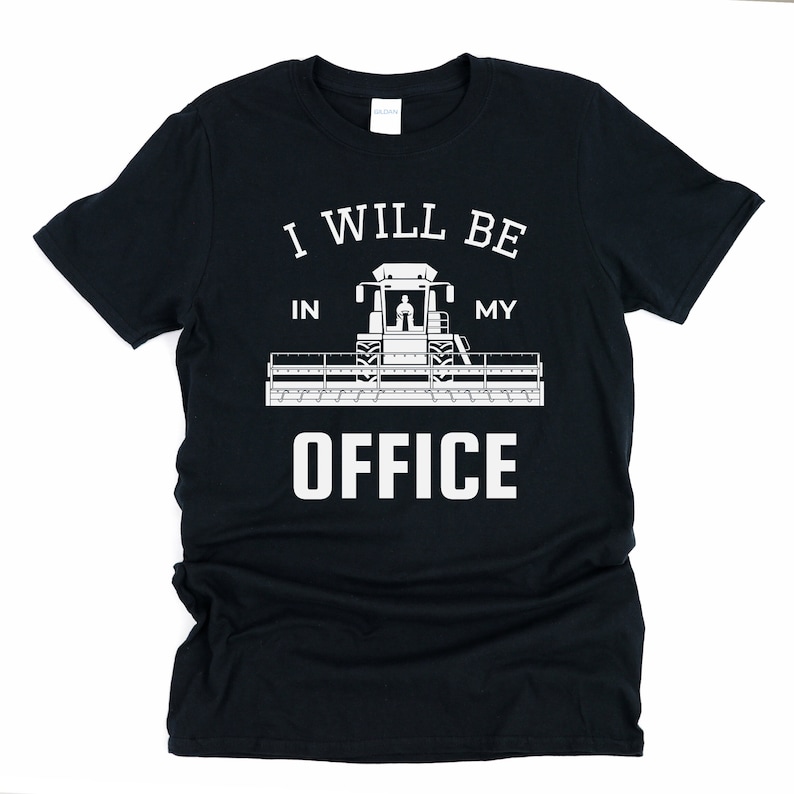 May include: Black t-shirt with a white graphic of a combine harvester and the text "I will be in my office".