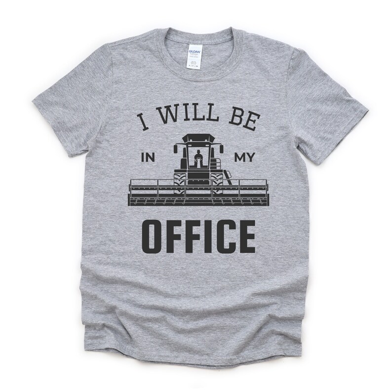 May include: Gray t-shirt with a black graphic of a combine harvester and the text "I will be in my office".
