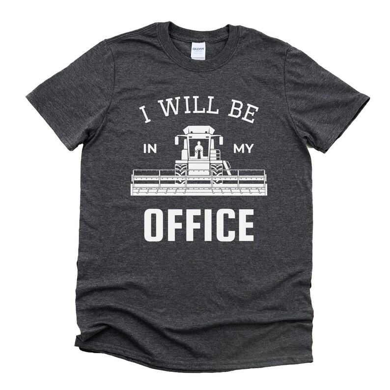 May include: Dark gray t-shirt with white text that reads "I will be in my office" with a white silhouette of a combine harvester.