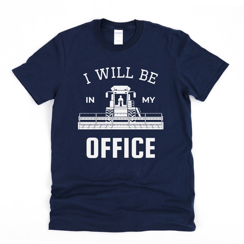May include: Navy blue t-shirt with a white graphic of a combine harvester and the text "I will be in my office".