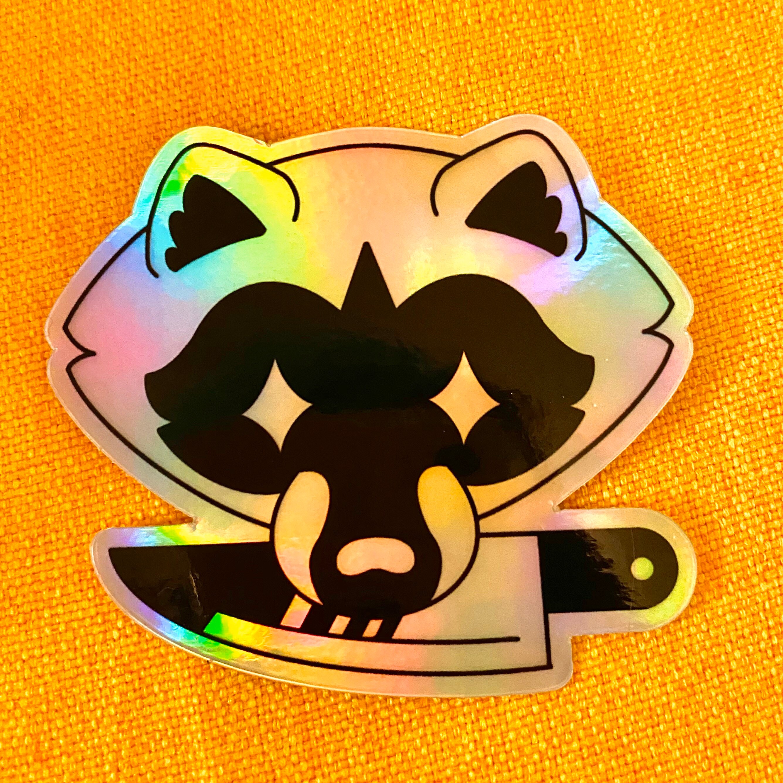 Knife Raccoon Holographic Vinyl Sticker